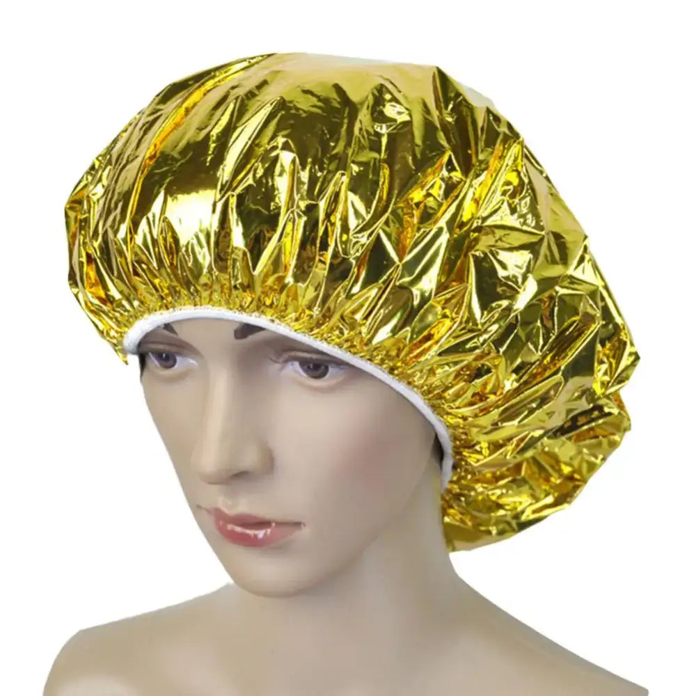 Shiny gold shower cap or hair covering worn on a mannequin head.