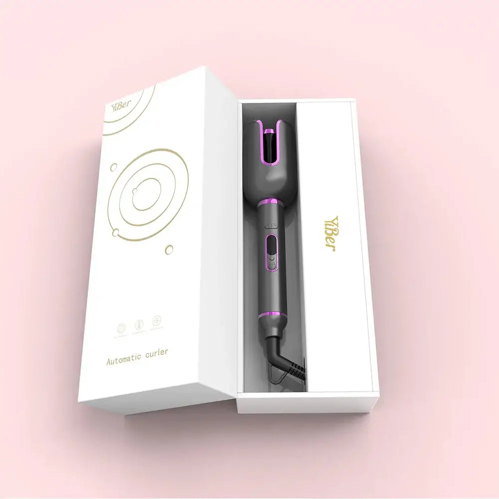 Hair styling tool with a cylindrical barrel and purple accents in an open white box.