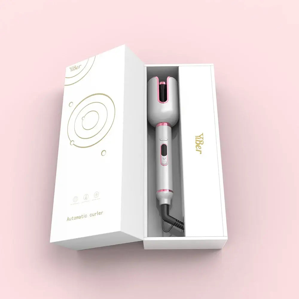 Automatic hair curler in a white packaging box.