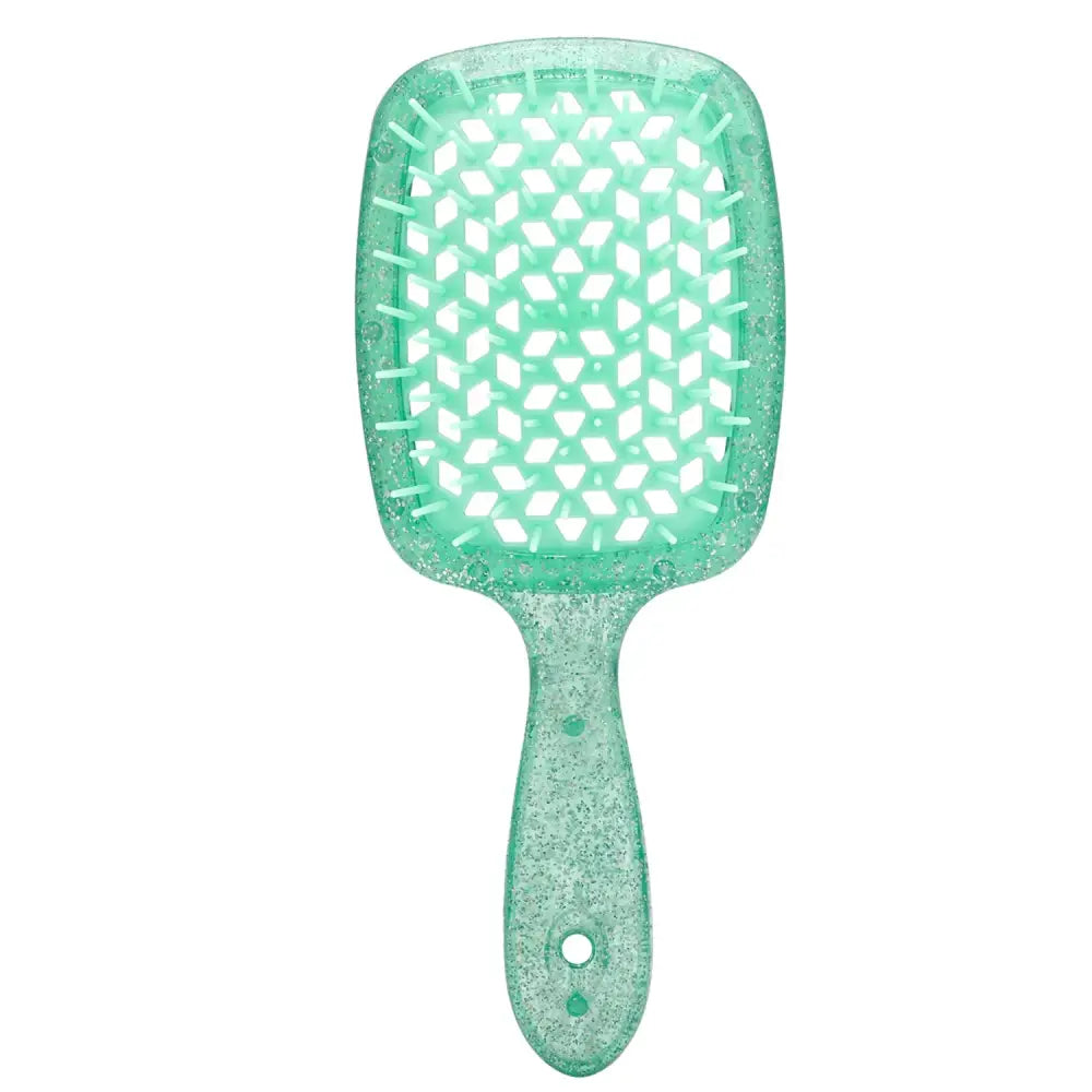 Mint green paddle hairbrush with a glittery finish.