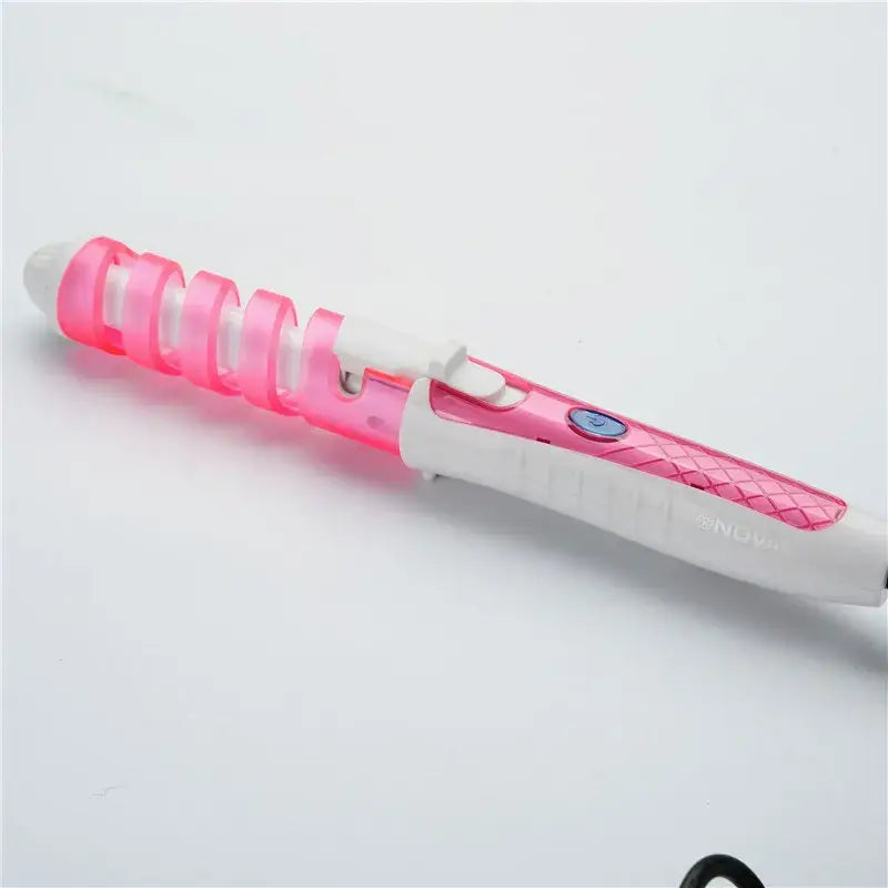 Pink and white electric toothbrush with a spiral handle design.