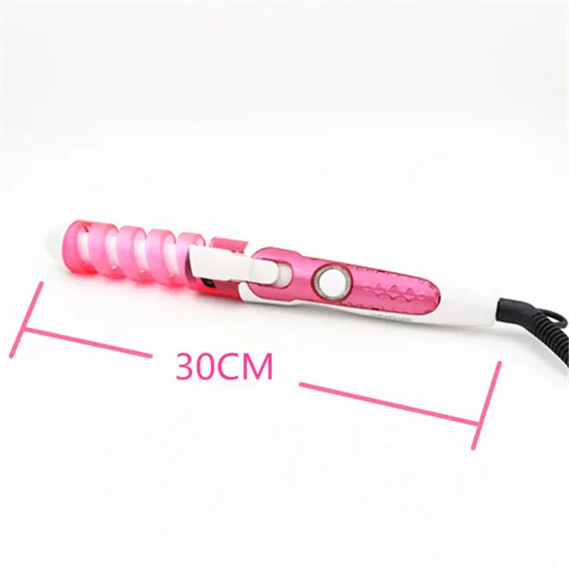 Pink and white hair curling iron with a spiral-shaped barrel.