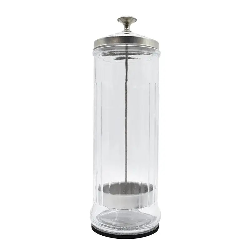 Glass jar with a metal lid and base, typically used for storing barbershop tools or medical supplies.