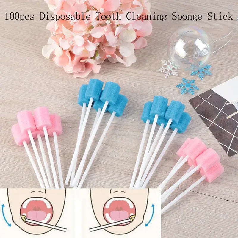 Disposable tooth cleaning sponge sticks in pink and blue colors.