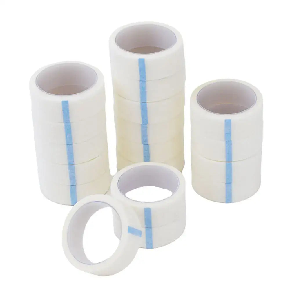 Medical adhesive tape rolls with blue measurement markings.