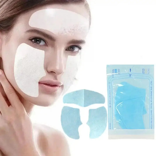 Facial sheet mask with white patches applied to a woman’s skin.