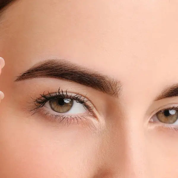 Close-up view of a person’s eyes and eyebrows.