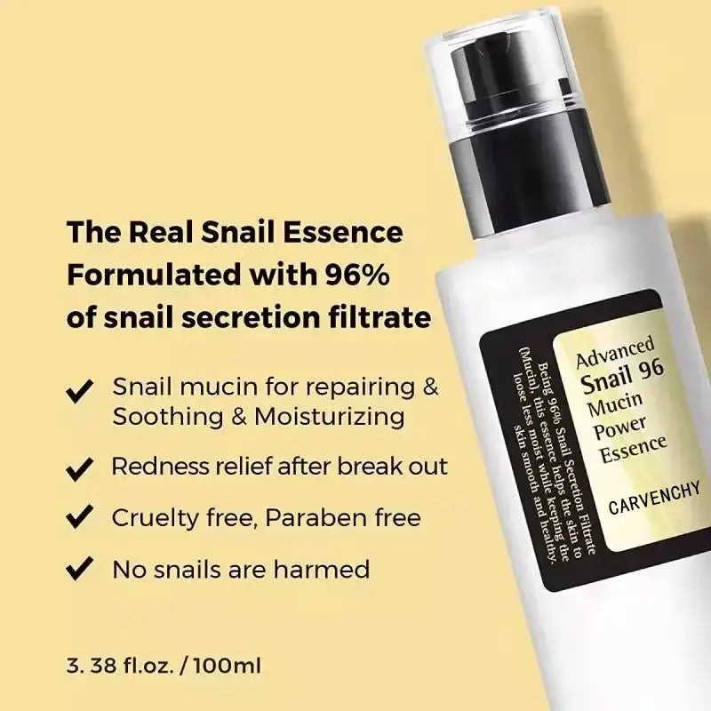 Bottle of snail essence skincare product with black and white packaging.