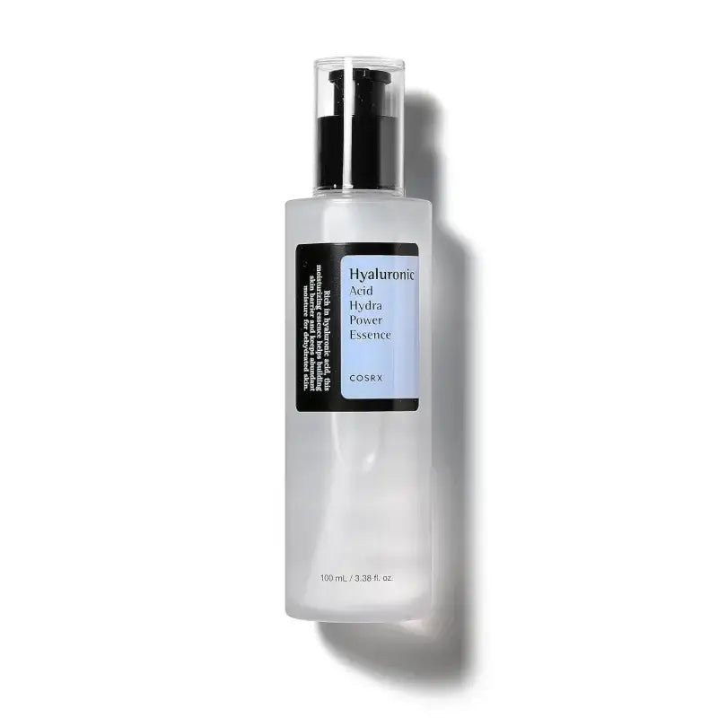 White bottle of Hyaluronic Acid hydrating essence with a black pump dispenser.