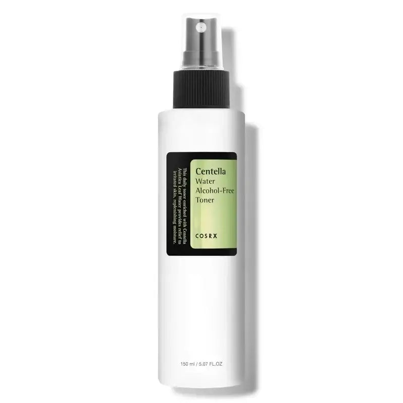 White spray bottle with a black nozzle and green label containing Centella Asiatica toner.