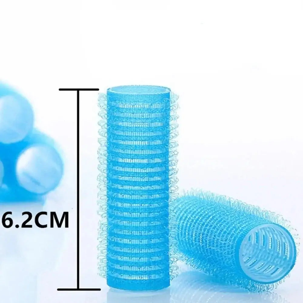 Blue plastic hair rollers with a textured surface.