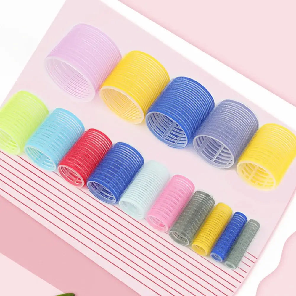 Colorful plastic hair rollers or curlers in various sizes.