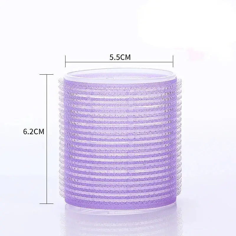 Purple cylindrical hair roller with horizontal ridges.