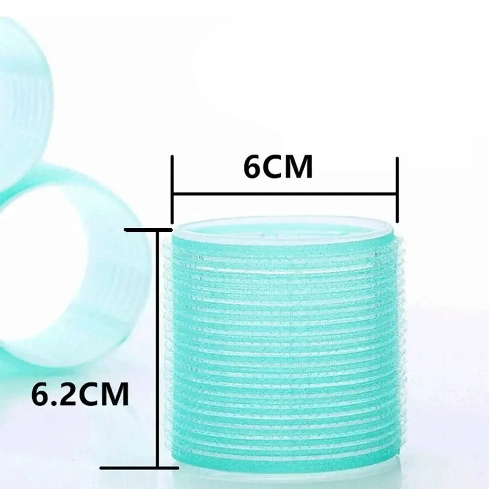 Teal-colored cylindrical hair roller with ridged texture.