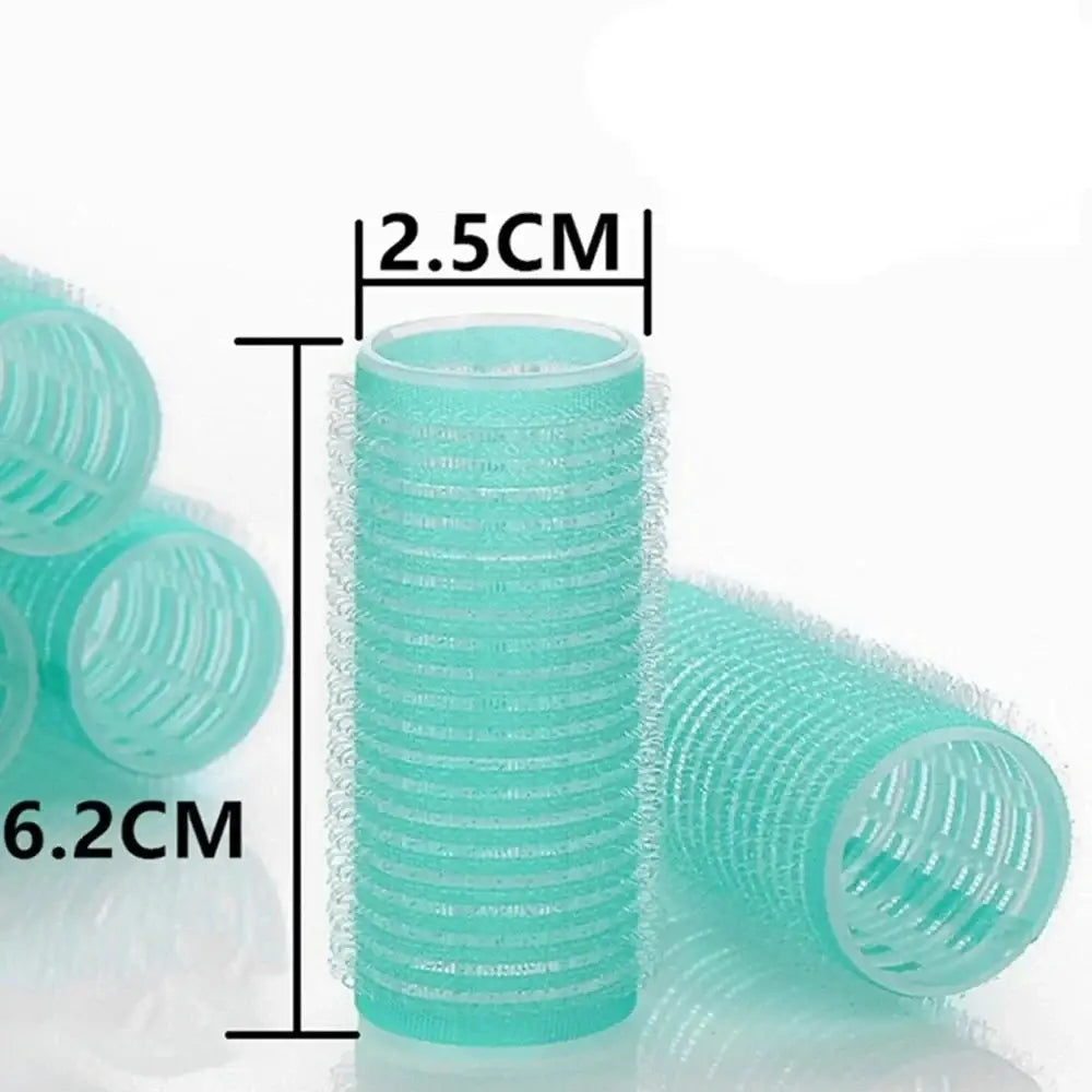 Teal-colored plastic hair roller with ridged surface and hollow center.