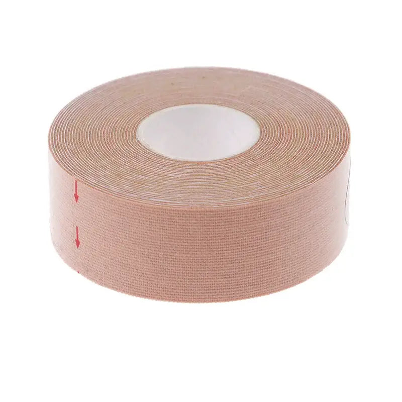 Roll of beige kinesiology or athletic tape.