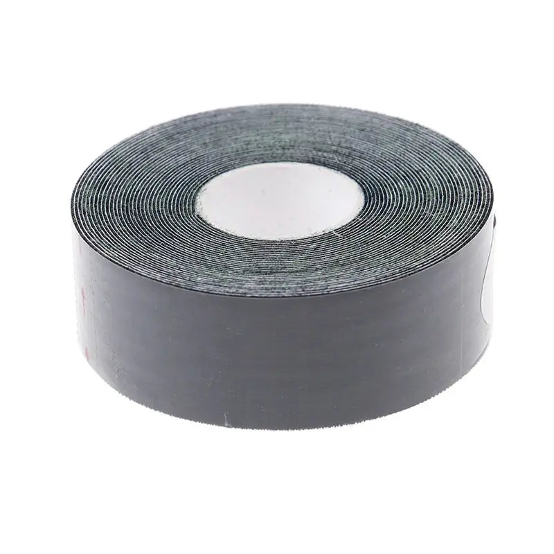 Roll of dark gray adhesive tape or sealant strip.