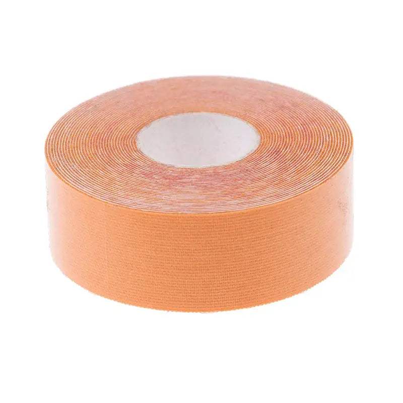 Roll of orange kinesiology or athletic tape.