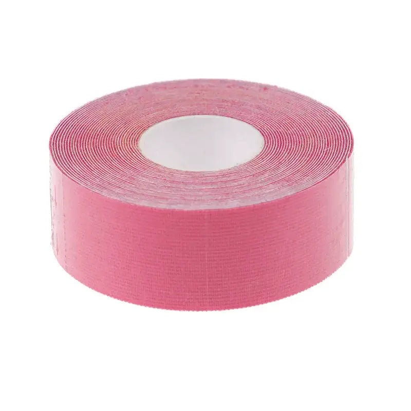 Roll of pink adhesive tape or kinesiology tape.