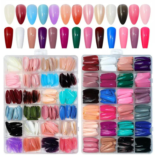 Collection of colorful nail tips and artificial nails in various shapes and shades.