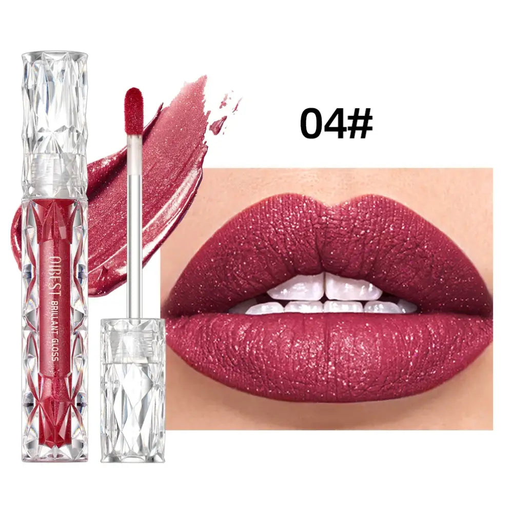 Lipstick or lip gloss in a deep berry shade, shown both in its tube and applied to lips.