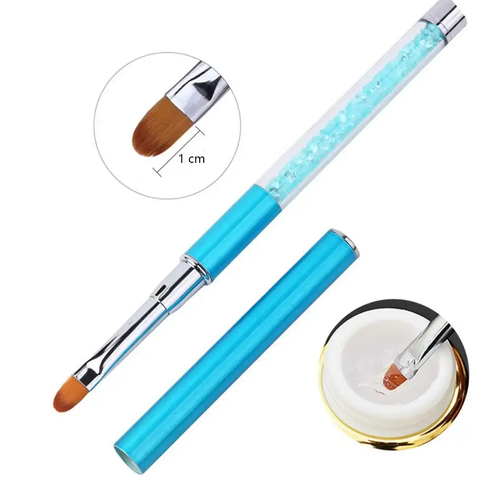 Dual-ended nail art brush with a blue handle and crystal-filled upper portion.