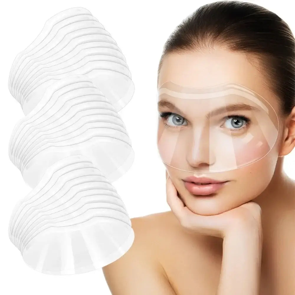 Woman’s face with clear skin next to white cotton pads.