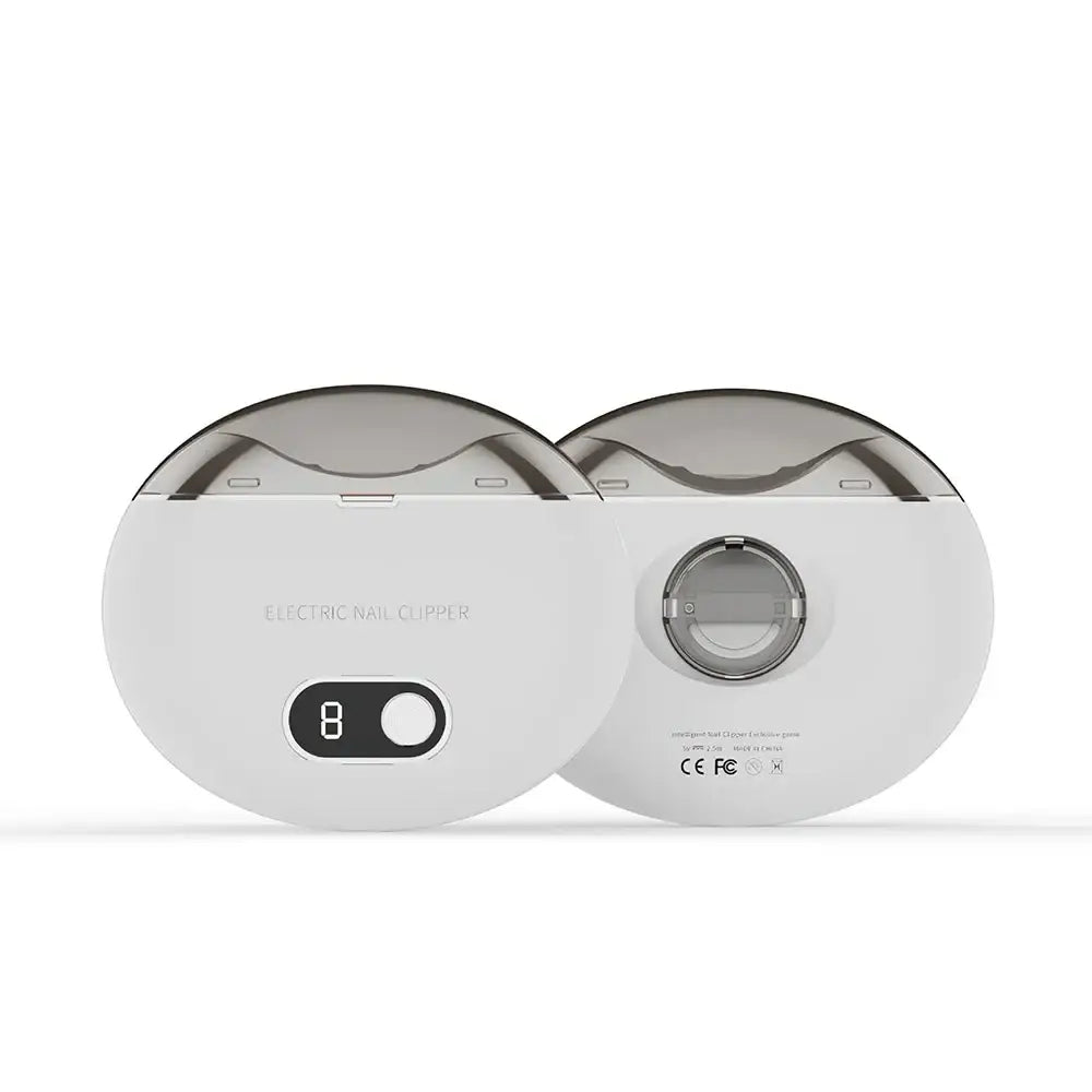 Pair of white, circular electronic devices connected side-by-side with a digital display and button visible.