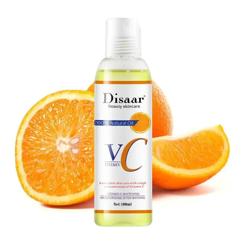 Bottle of Disaar vitamin C skincare product alongside orange slices.