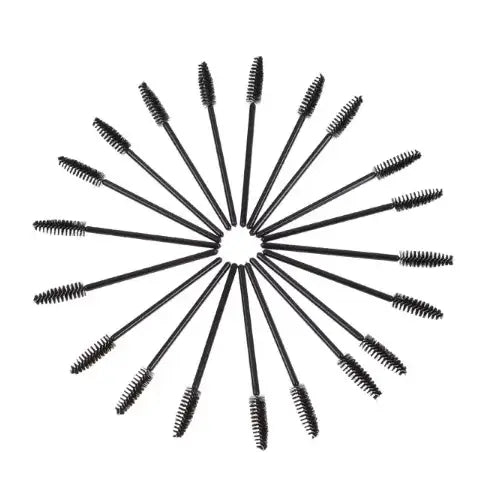 Circular arrangement of mascara wands or eyelash brushes.