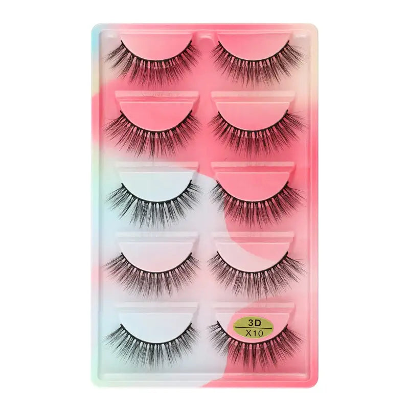 Set of five pairs of false eyelashes in a pastel-colored packaging.