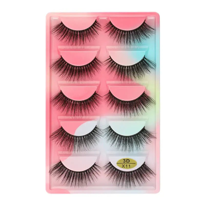 Set of five pairs of false eyelashes in a pink packaging case.