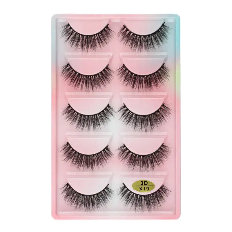 Set of five pairs of false eyelashes in a pastel-colored packaging.