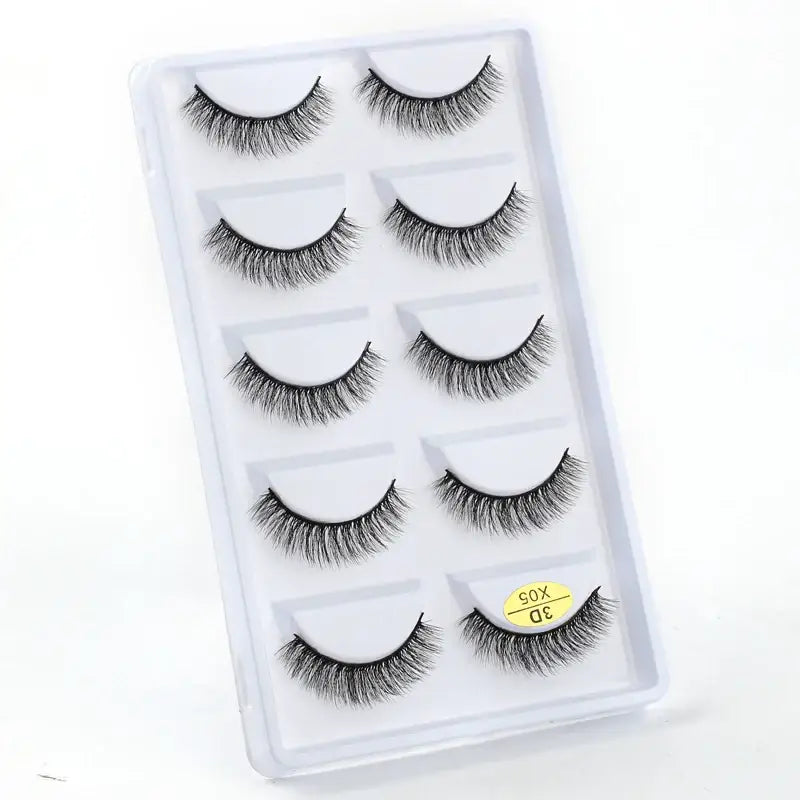 Set of five pairs of false eyelashes in a clear plastic case.