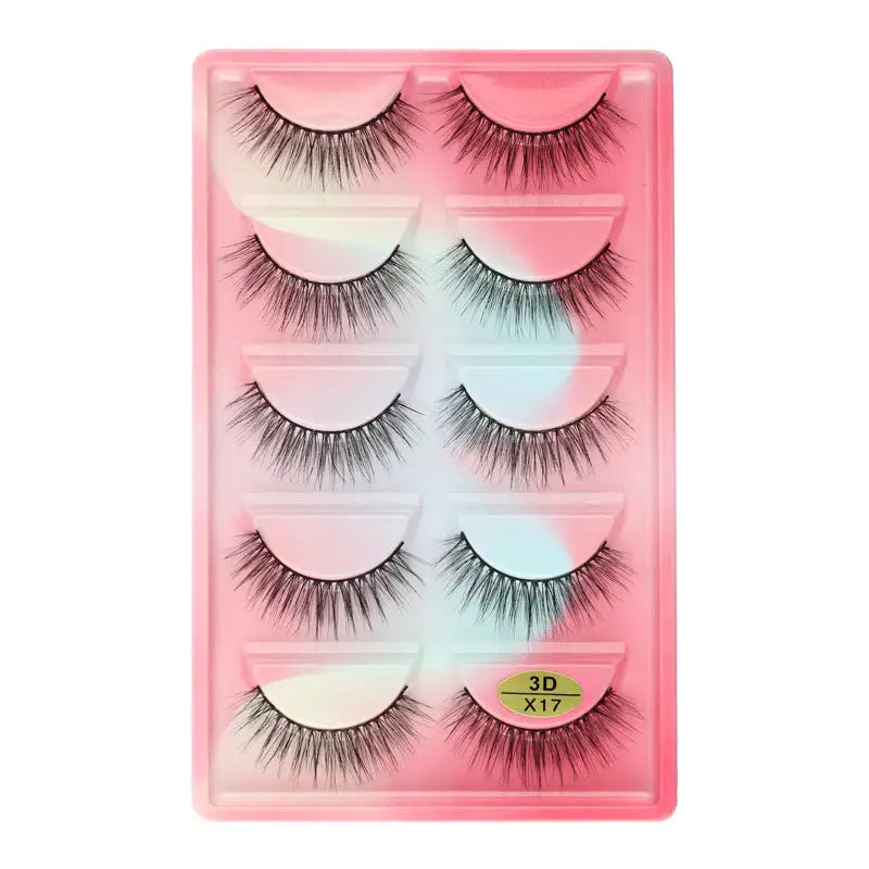 Set of five pairs of false eyelashes in a pink plastic case.