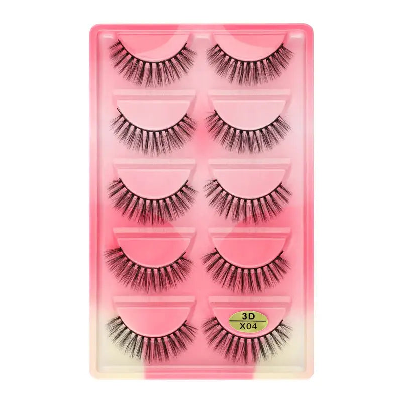 Set of five pairs of false eyelashes in a pink plastic case.