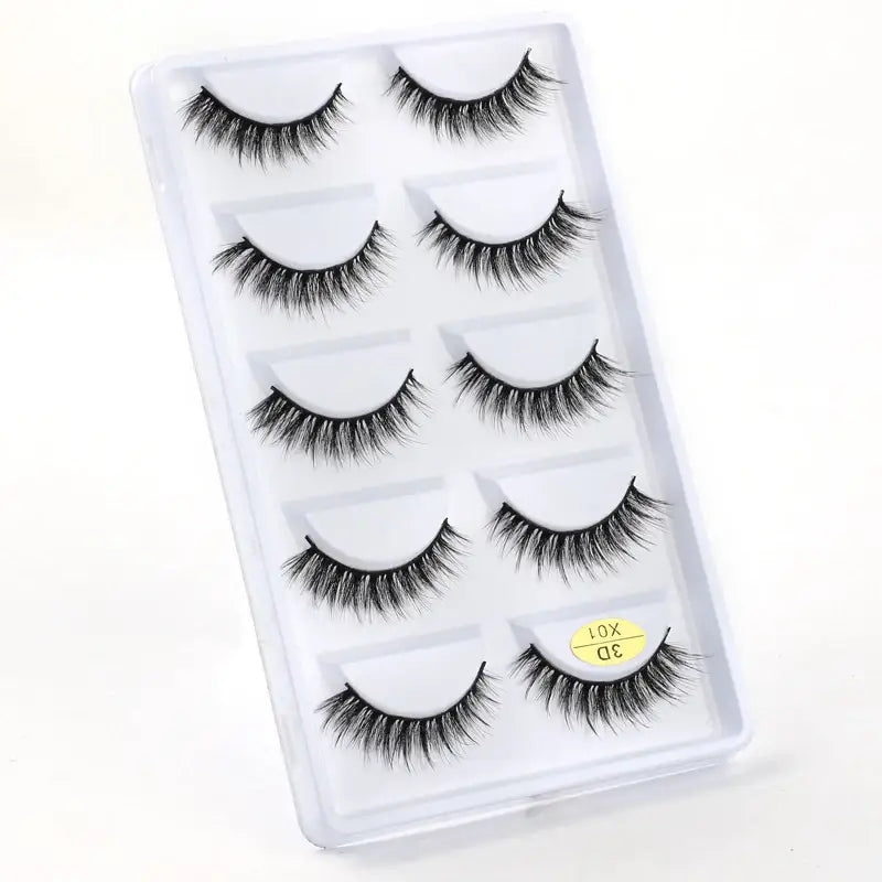 Set of five pairs of false eyelashes in a clear plastic case.