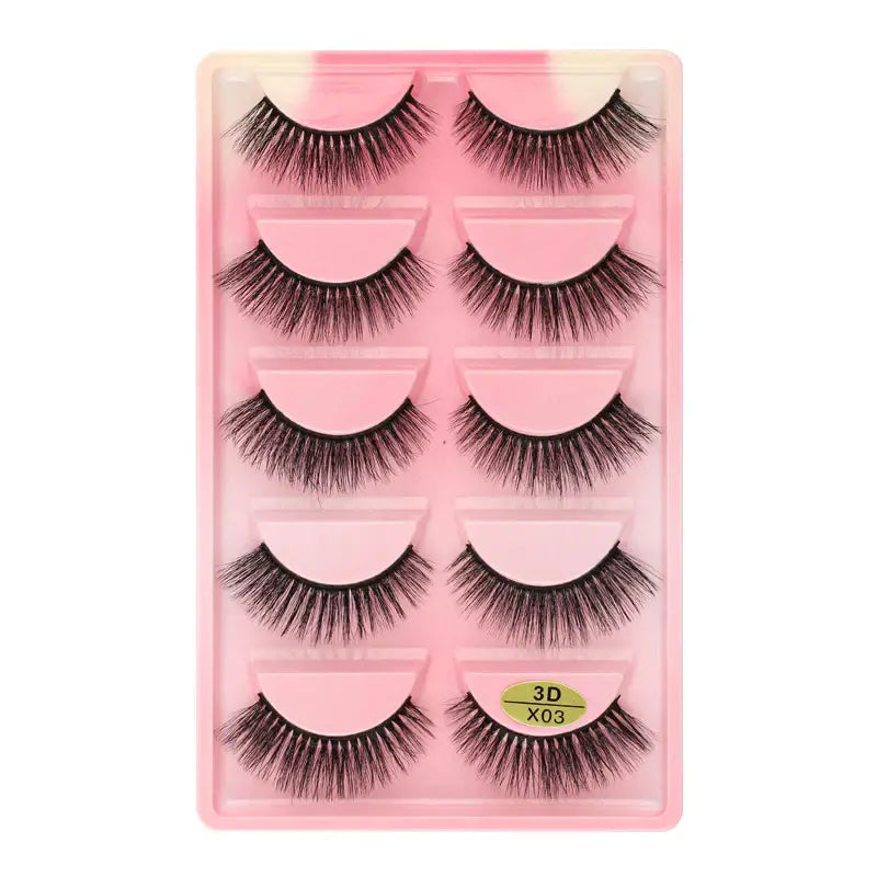 Set of five pairs of false eyelashes in a pink packaging case.