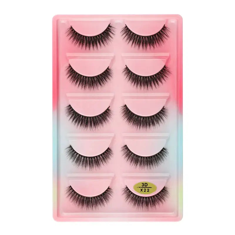 Set of five pairs of false eyelashes in a pink gradient packaging.