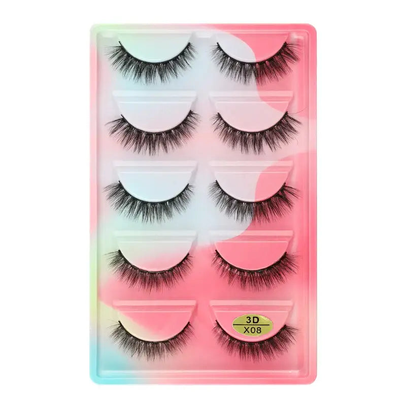 Set of five pairs of false eyelashes in a colorful plastic case.