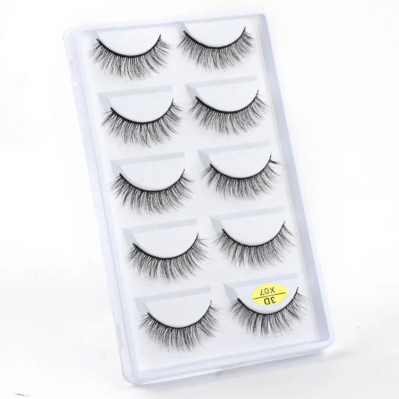 Set of five pairs of false eyelashes in a clear plastic case.