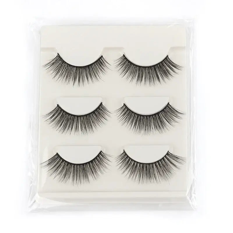 Set of three pairs of false eyelashes in a clear plastic package.