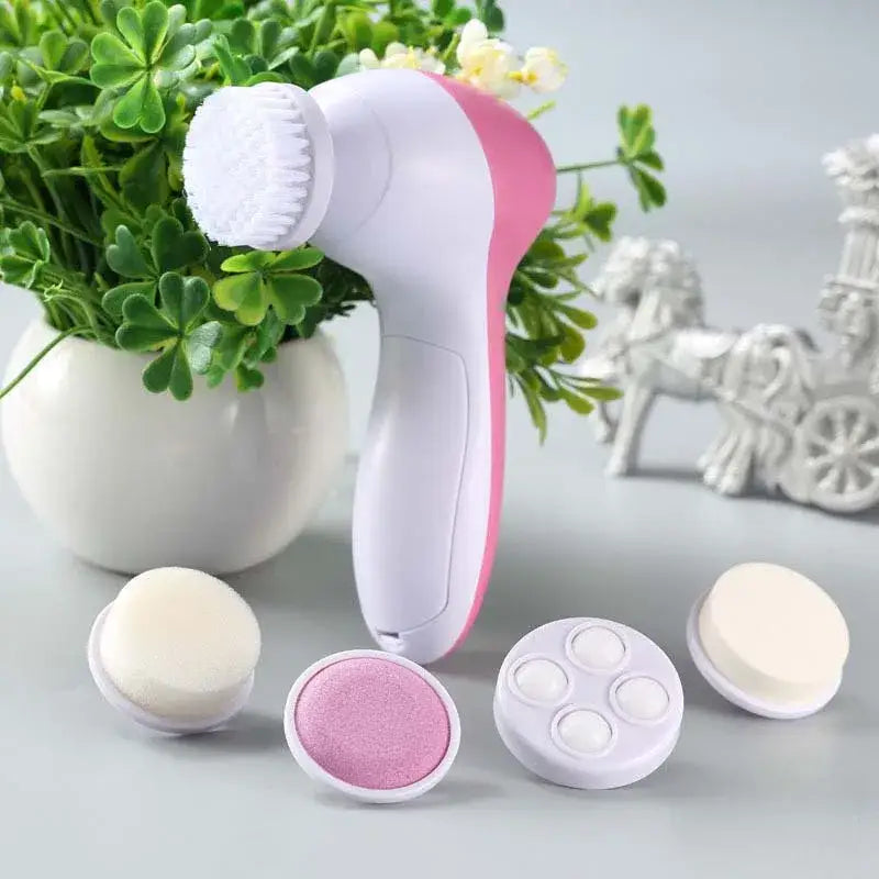 Pink and white electric facial cleansing brush with interchangeable heads.