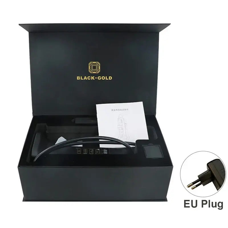 Black gift box containing a hair styling tool with an EU plug.