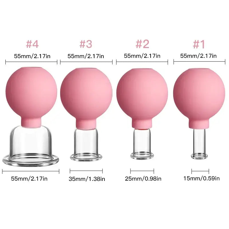 Set of four pink silicone cupping devices with transparent glass bases of varying heights.