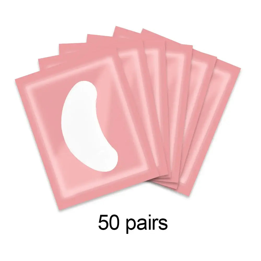 Pink eye patches or gel pads, stacked in a fan-like arrangement.