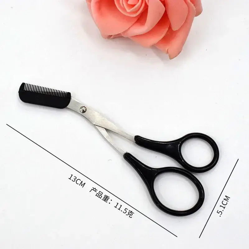 Scissors with a comb attachment on one blade.