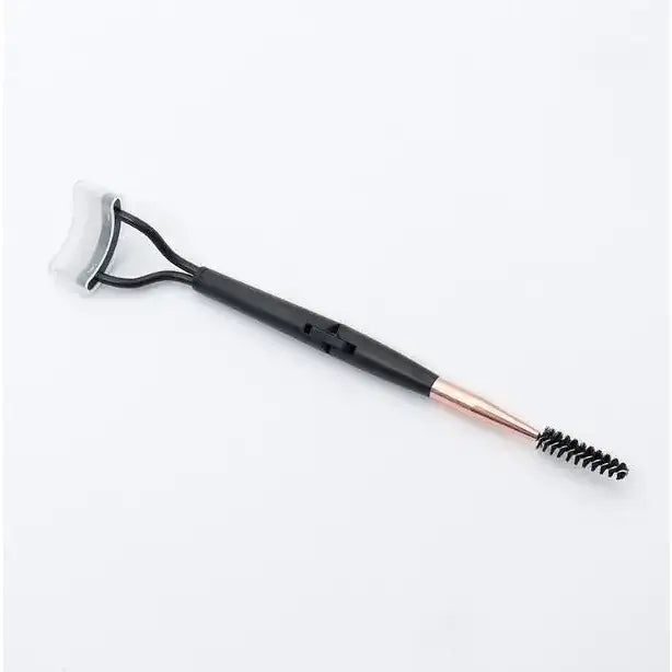 Dual-ended makeup tool with a spoolie brush on one end and a curved applicator on the other.