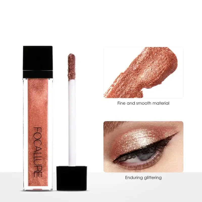 Shimmery rose gold liquid lipstick or eyeshadow in a clear tube with black cap.