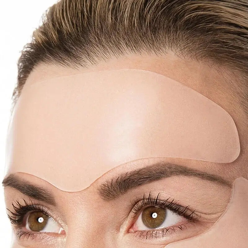 Adhesive forehead patch or strip used for wrinkle reduction or skincare treatments.